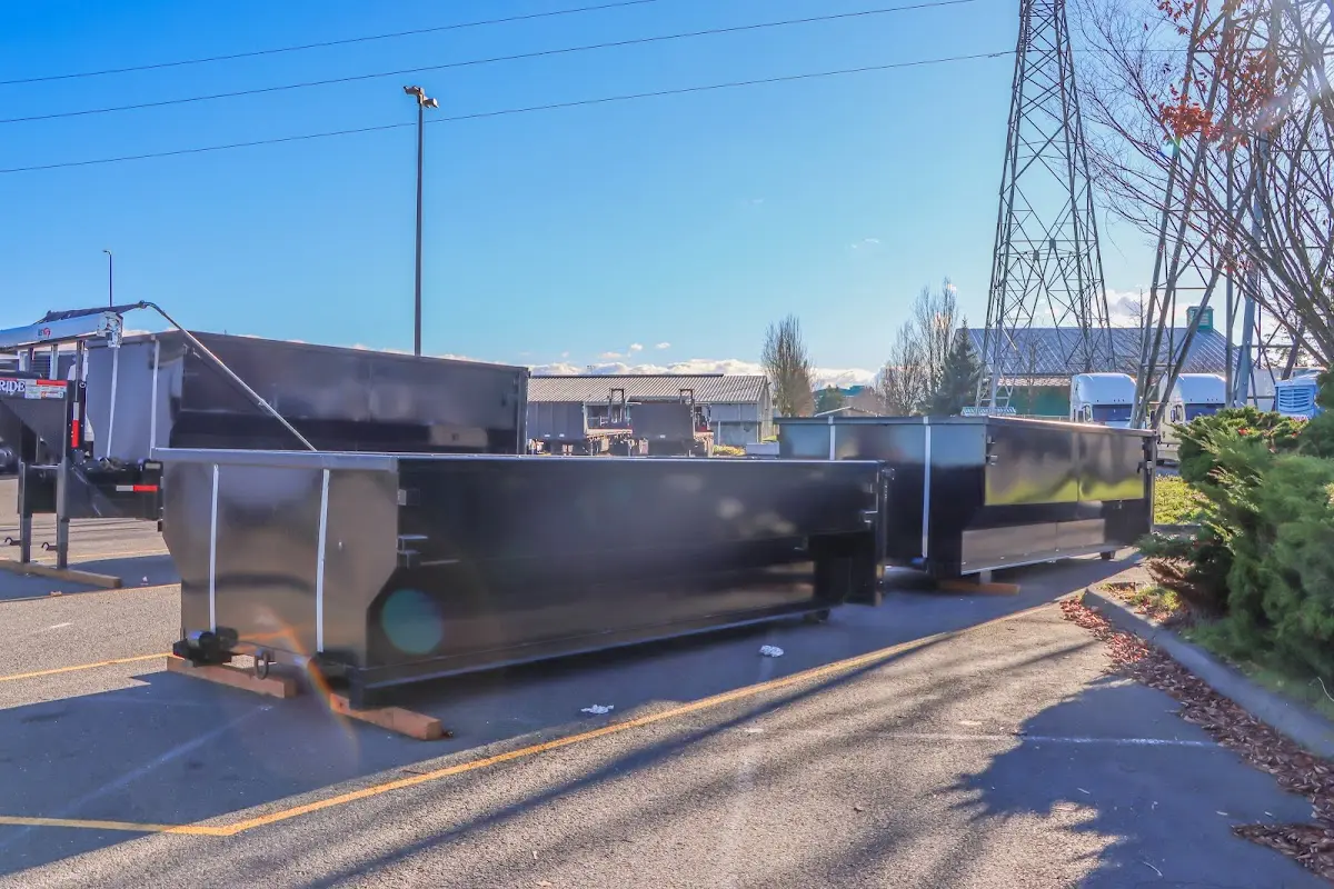 Roll-off dumpster ready for waste disposal at job site for 2 Yard Dumpster Rental in Hollister